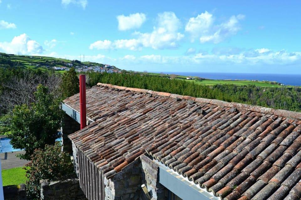Holiday cottage rental with shared pool, sea and mountain view Vacation rental in Azores District