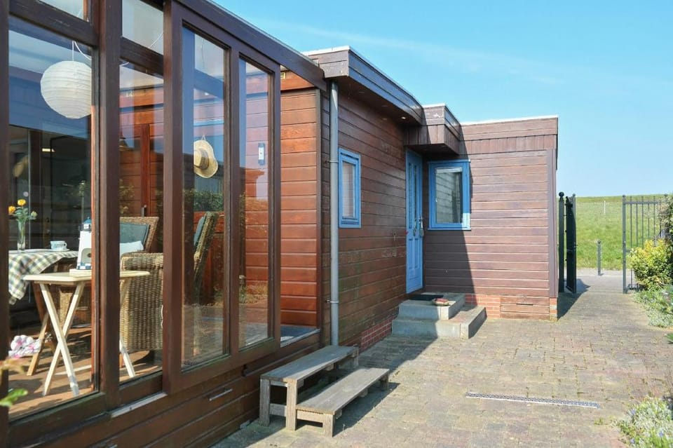 Entire house - 4pers House w Sauna, Winter garden fishing pier in front of the Lauwersmeer Vacation rental in Anjum