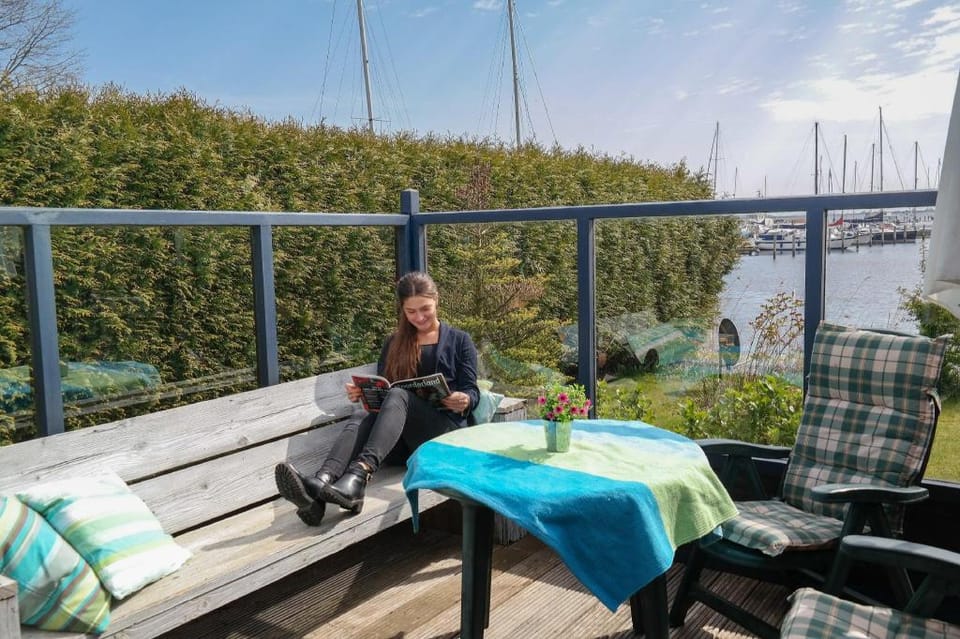 Entire house - 4 pers Holiday home Zeemeeuw with own fishing pier in front of the Lauwersmeer Vacation rental in Anjum