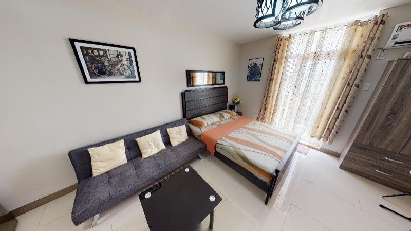 CebuNightSkyCondoTel w/Balcony Near Mactan Airport Apartment in Lapu-Lapu City