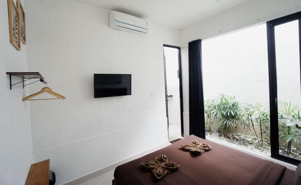 Escotel Tempekan Guest House Bed and Breakfast in North Kuta