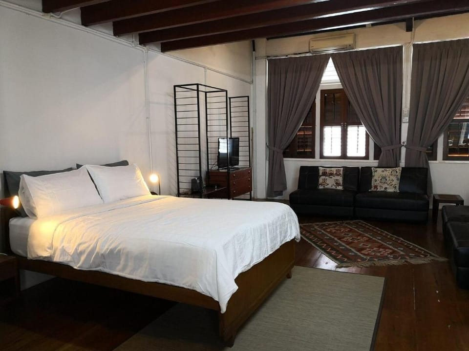Loft living in a heritage shophouse Apartment in George Town