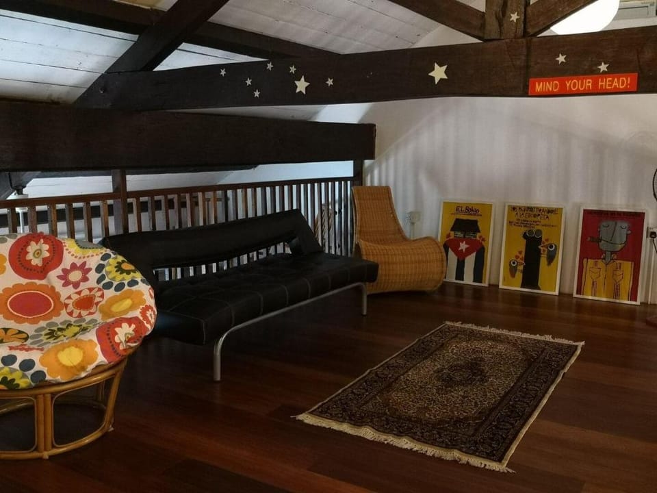 Loft living in a heritage shophouse Apartment in George Town