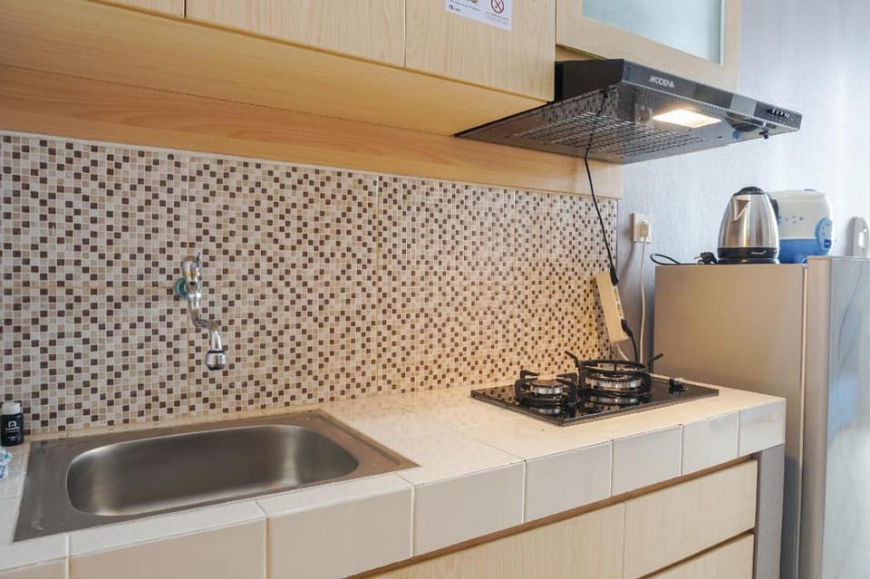 Comfy Minimalist Studio Dave near UI By Travelio Apartment in Jakarta