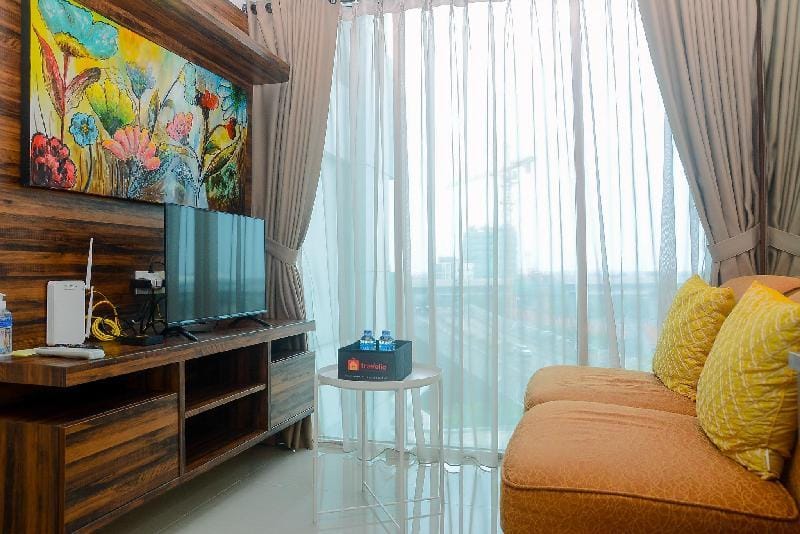 Cozy & Simple 1BR Grand Kamala Lagoon By Travelio Apartment in West Java