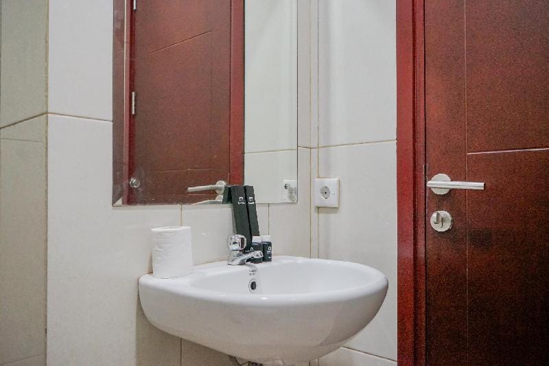 Elegant and Relaxing 1BR Asatti BSD By Travelio Apartment in West Java