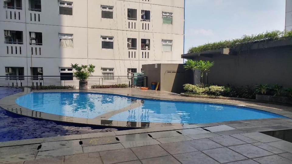 Furnished Green Pramuka 1BR Apartment By Travelio Apartment in Jakarta