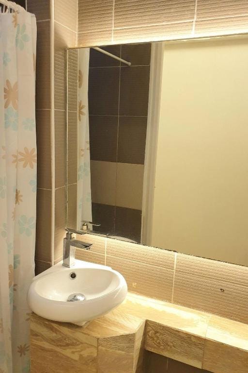 MPlace Cool w/ Netflix+Cooking+Wifi Apartment in Quezon City