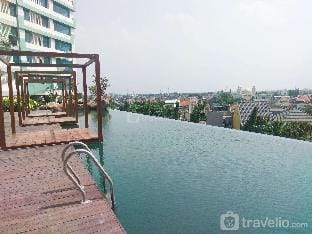 Cozy Stay 1BR at Grand Kamala Lagoon Apartment By Travelio Apartment in West Java