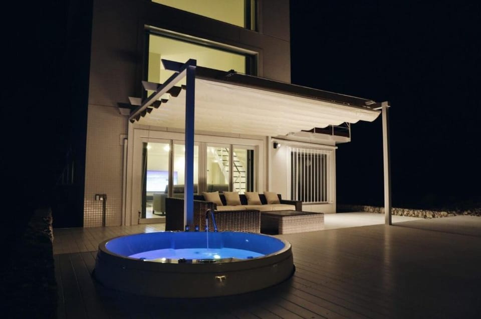 Jacuzzi and BBQ w/ Oceanview B Base Kouri Island Villa in Okinawa Prefecture