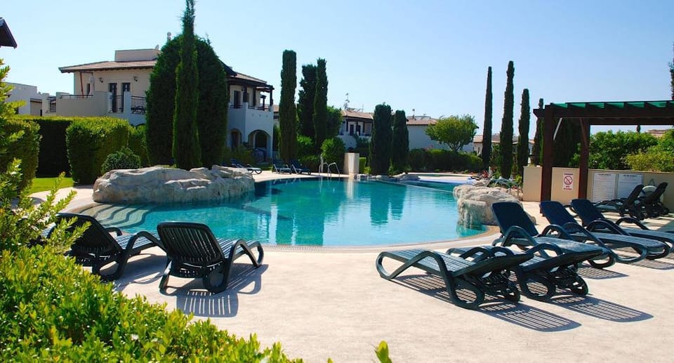 Poolside ground floor apartment 'DC01' - Helios Heights Village on Aphrodite Hills Resort Apartment in Kouklia
