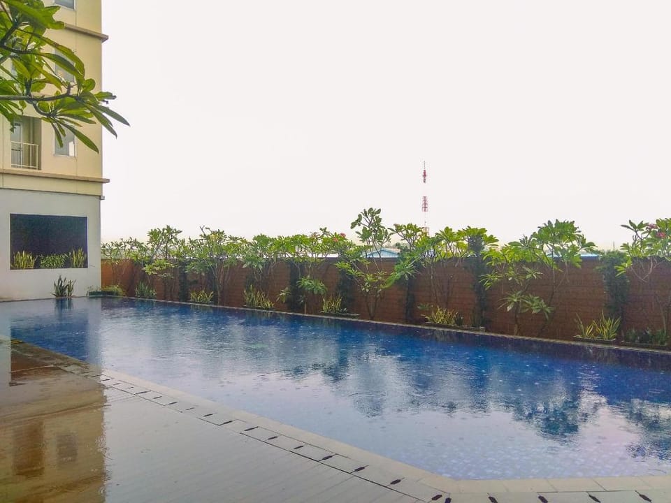 Cozy Stay 2BR Tamansari Mahogany Apt By Travelio Apartment in West Java