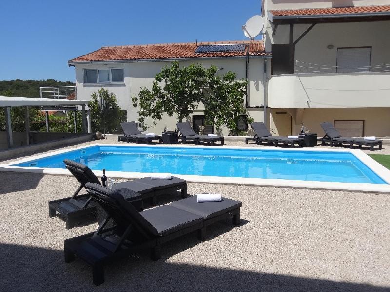 Modern island apartment with pool 80 meters from the sea B Apartment in Šibenik-Knin County, Croatia