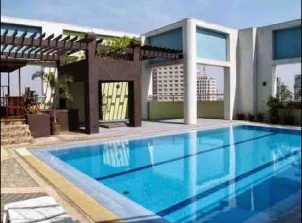 Skyline View room across Greenbelt Apartment in Manila City