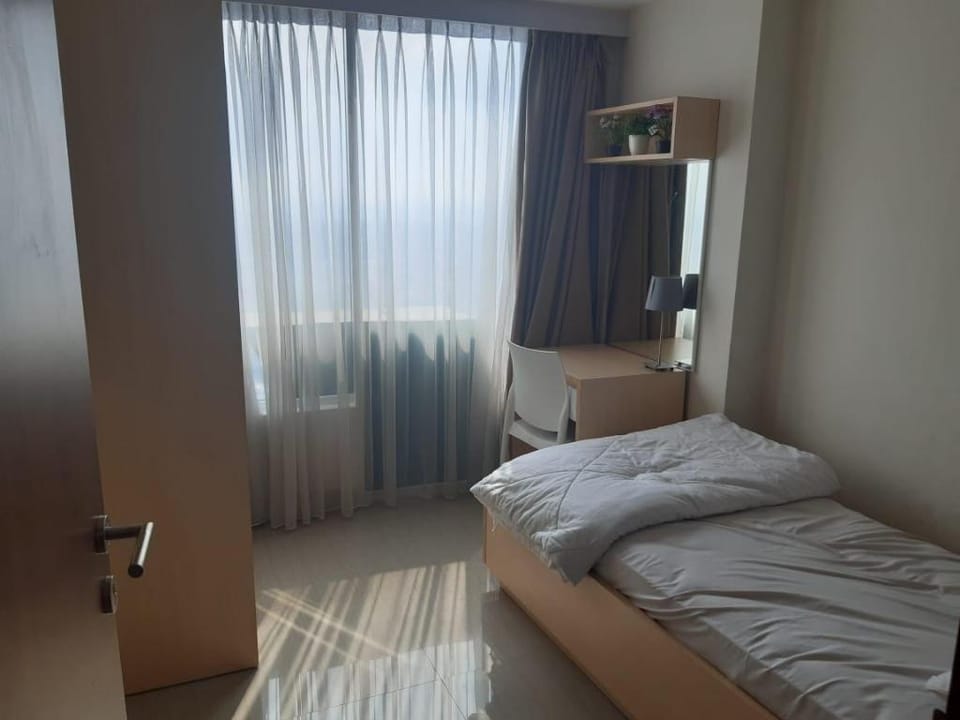 Grand Kamala Lagoon 2Bedroom By Happy Room's Apartment in West Java