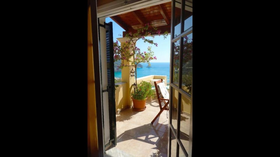 Natalia Apartment A with panoramic sea views of Agios Gordios bay Apartment in Corfu, Greece