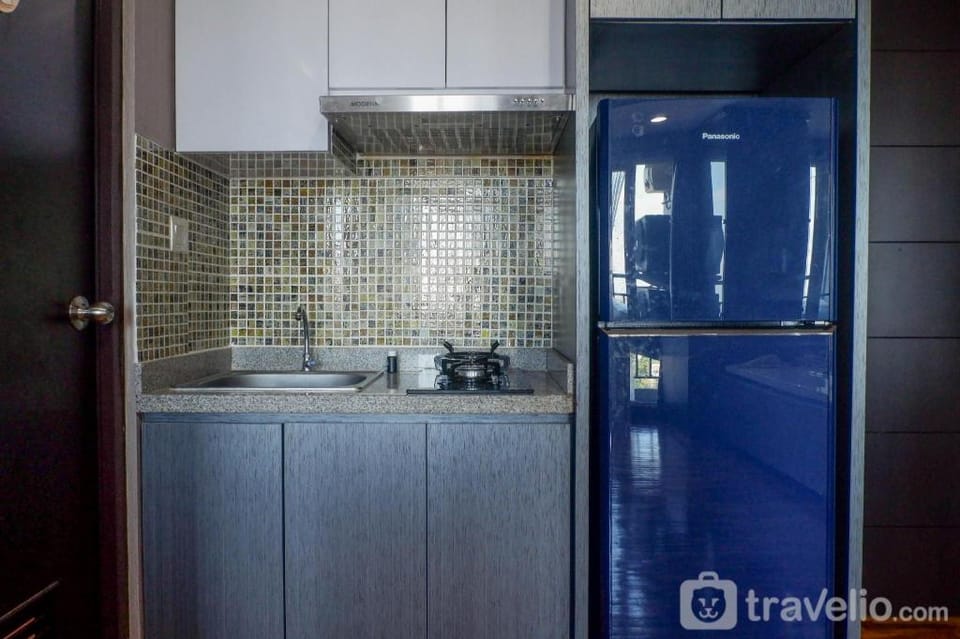 Exquisite 1BR Tamansari Papilio By Travelio Apartment in Surabaya