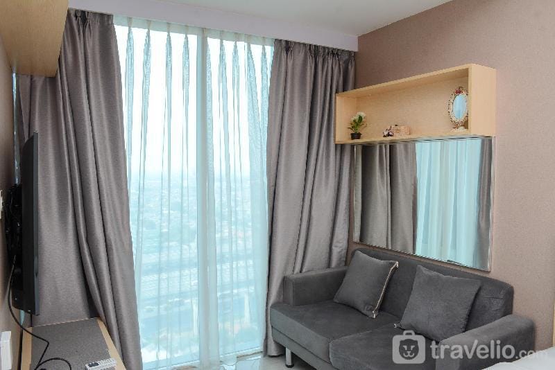 Cozy Living 1BR at Grand Kamala Lagoon By Travelio Apartment in West Java