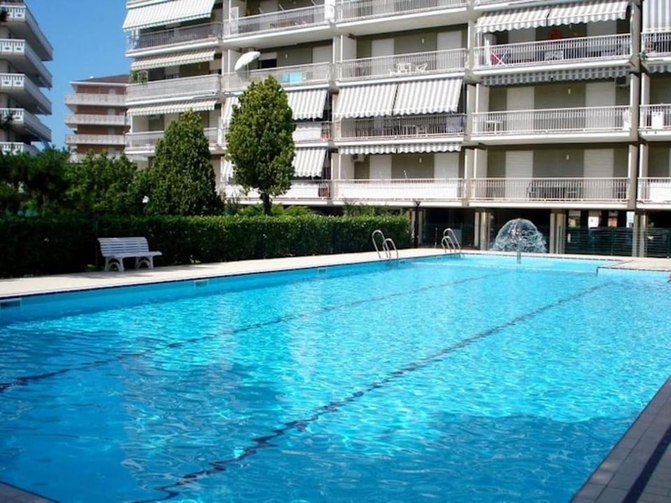 Welcoming flat with pool view balcony Apartment in Porto Santa Margherita