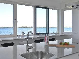 Waterfront penthouse with roof terrace Apartment in Kamperland