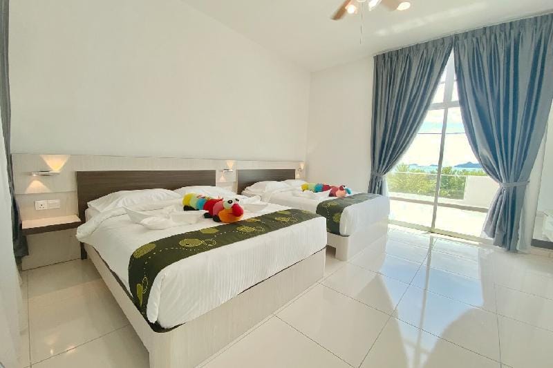 Cozy Seaview Townhouse | Hai Jing Du Jia Wu | 5-minute distance to restaurants and duty-free shops Vacation rental in Kedah