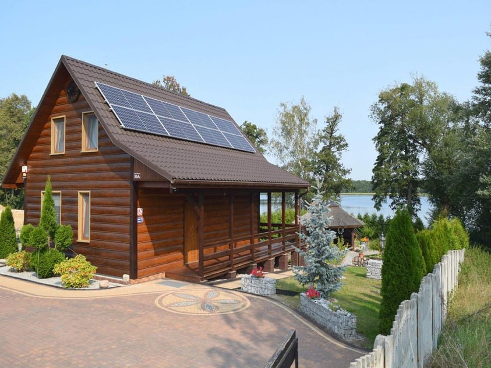 Holiday Home by Lake in Nowa Wioska Vacation rental in Poland