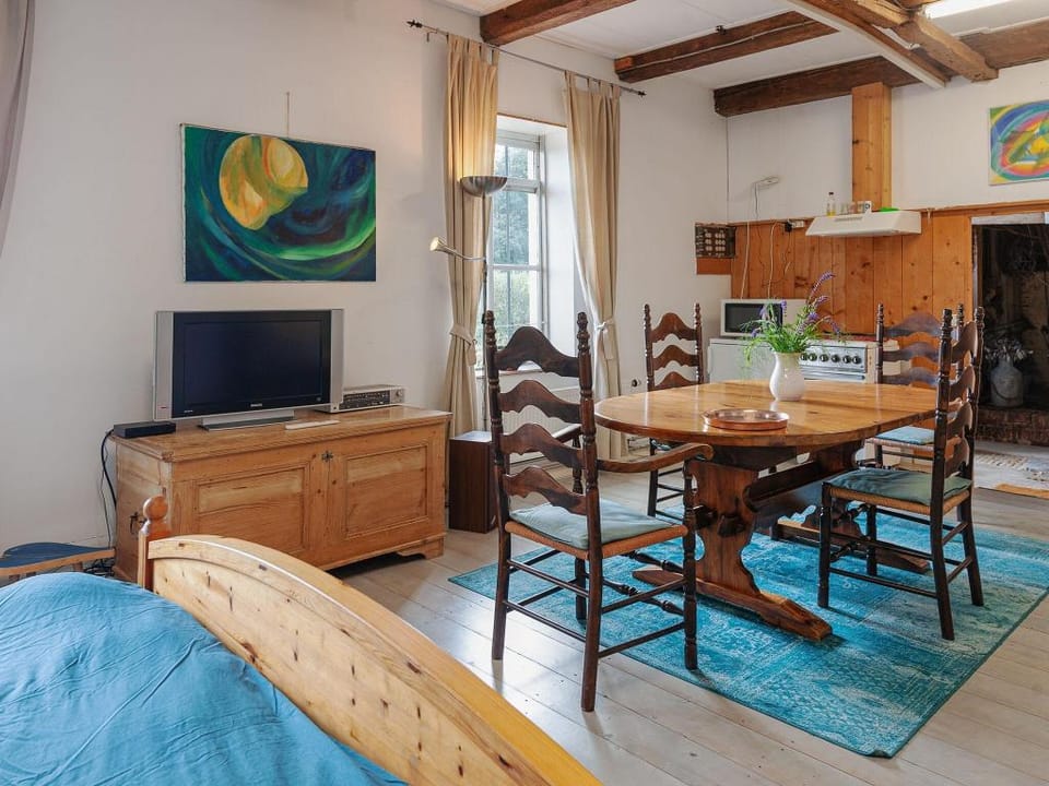 Farmhouse by Lauwers River with Rowing Boat Apartment in Friesland, Netherlands