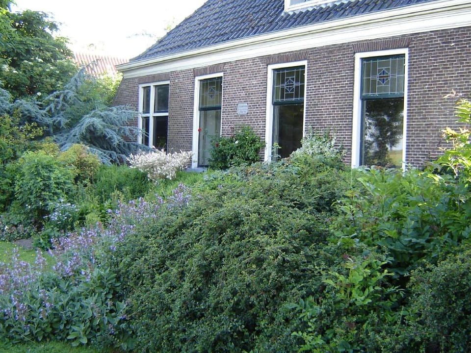 Waterfront Stelp Farmhouse with Sauna Vacation rental in Friesland, Netherlands