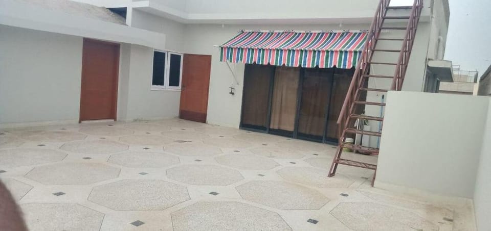 Converge Rooftop Guesthouse (Sunkissed) Vacation rental in Karachi