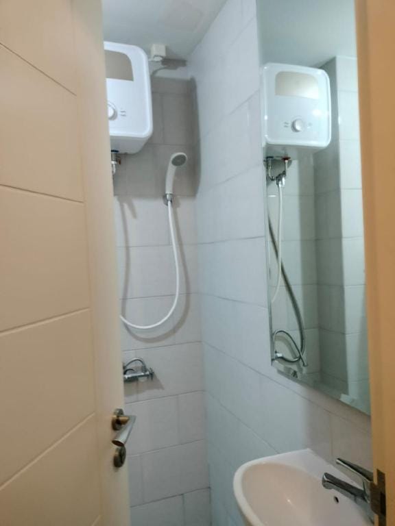 The Asando Family  With 3  Rooms  - F7 @Pakuwon Apartment in Surabaya