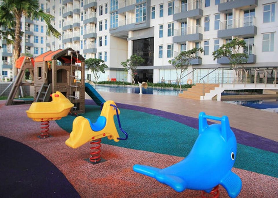 The Asando Family  With 3  Rooms  - F7 @Pakuwon Apartment in Surabaya
