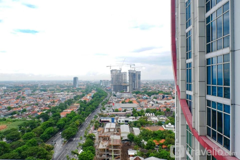 Warm Studio Apt at Tamansari Papilio By Travelio Apartment in Surabaya