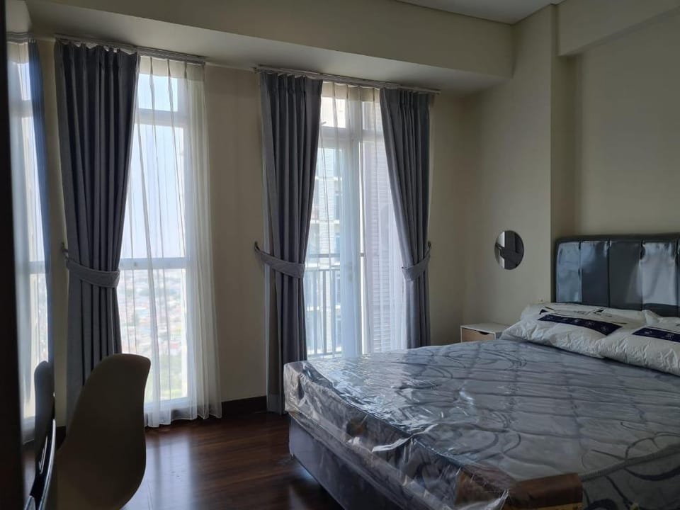 Cozy & Strategic Apartemen puri Orchard Apartment in Jakarta