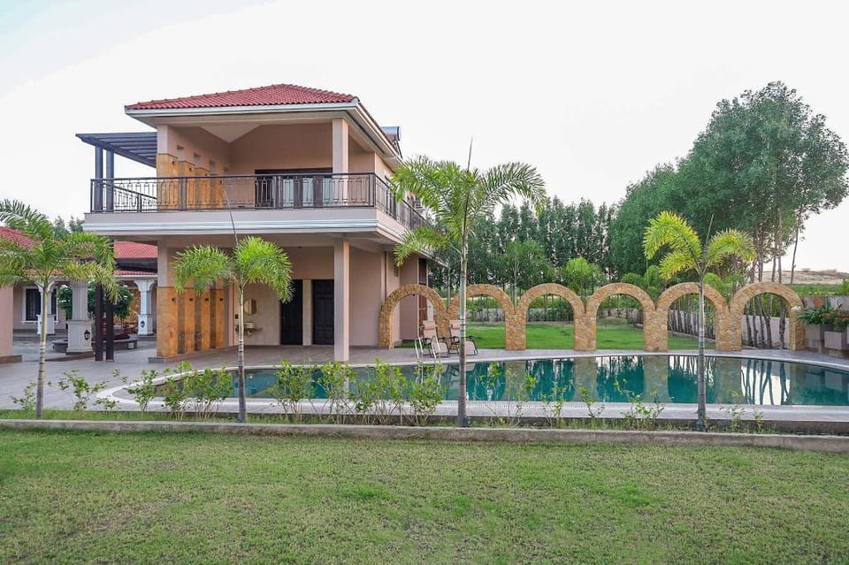 Desert Palms by StayVista in Kutch, nestled in orchards, features a swimming pool and a scenic balco Villa in Gujarat