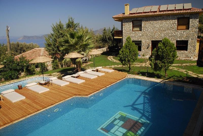 An unspoilt setting, luxurious surroundings and a warm, personal welcome Villa in Muğla Province