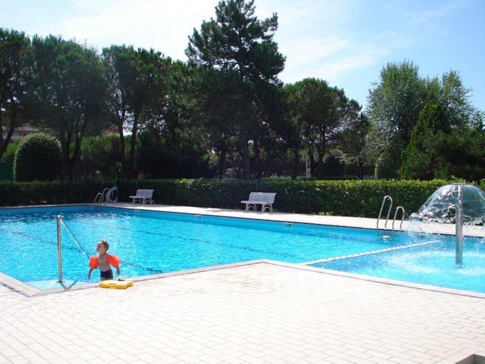 Beautiful apartment for 7 people with pool Apartment in Porto Santa Margherita