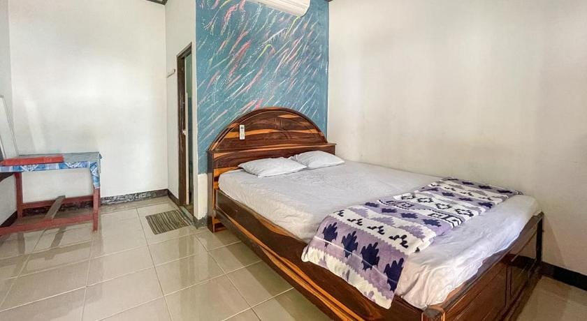 Ekas Beach Guesthouse Mitra RedDoorz Vacation rental in West Nusa Tenggara, Indonesia