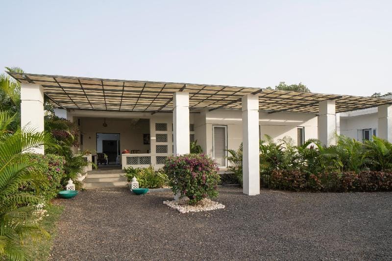 Whispering Palms by StayVista - Pool-view villa with Boutique interiors, Terrace & Lawn Villa in Maharashtra