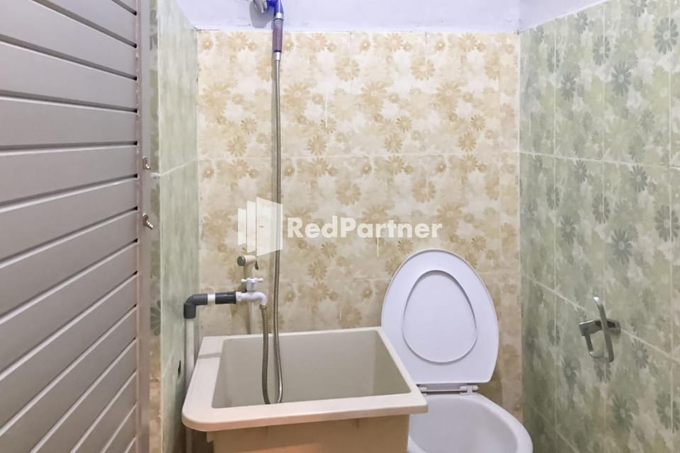 Aquino Marito Homestay Mitra RedDoorz Hotel in Indonesia