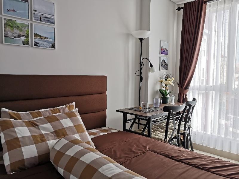 A Peaceful Room at Barsa City Apartment by Ciputra Apartment in Special Region of Yogyakarta