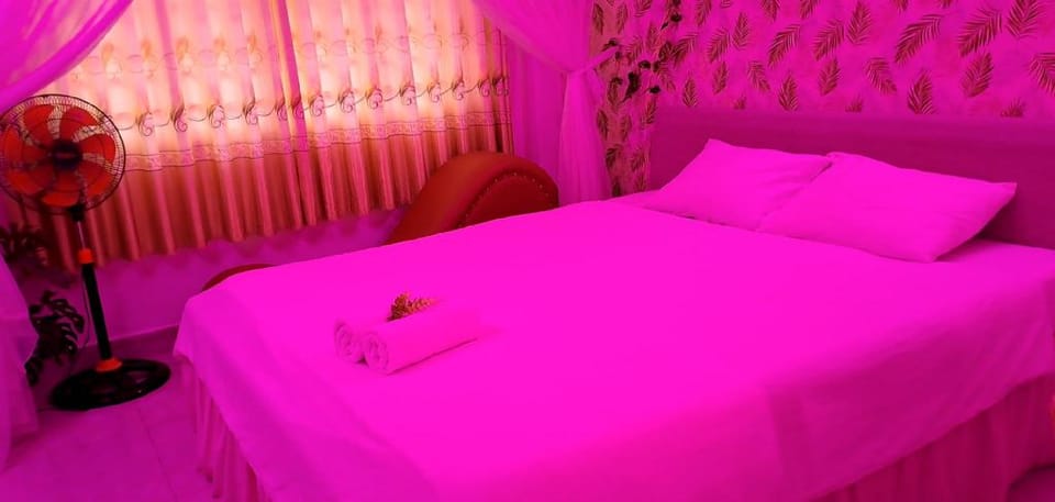 Quiet room with cosplay and love chair in Bui Vien Apartment in Ho Chi Minh City