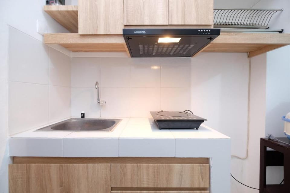 Modern & Homey Studio Gunung Putri Apt By Travelio Apartment in West Java