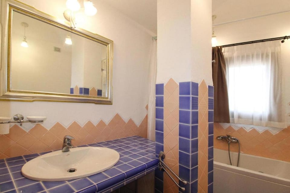 Holiday House, La Conia Cannigione Apartment in Sardinia