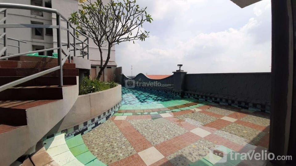 Cozy Pool View 2BR at Great Western By Travelio Apartment in West Java