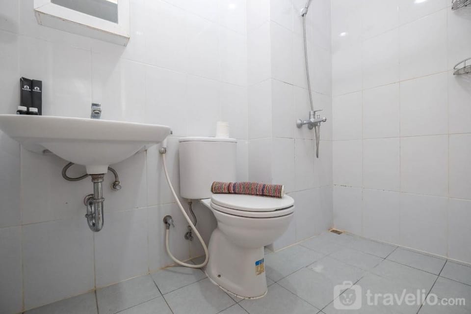 Comfy & Homey 2BR at Patraland Urbano By Travelio Apartment in West Java