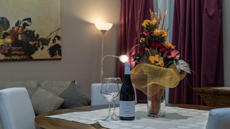 Dimora nobiliare nel salotto di Catania i Puritani Apartment in Catania