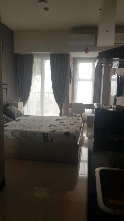 Bellvaroom 01 apartemen studio nyaman diatas mall Apartment in Surabaya