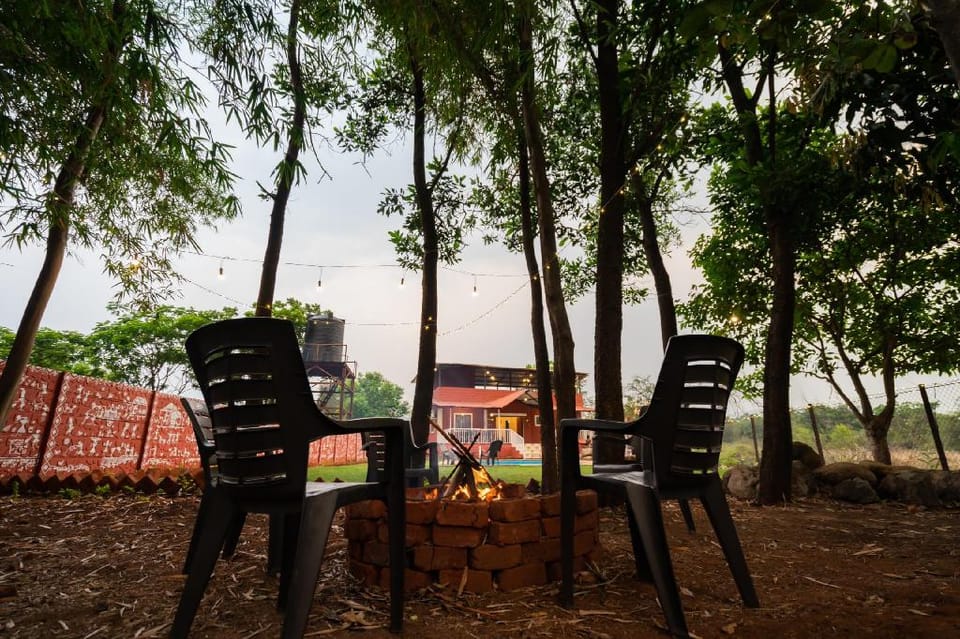 River side red stone villa Villa in Maharashtra