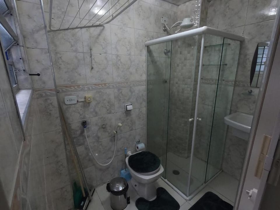 Sala living em prédio familiar na Avenida da praia Apartment in Santos