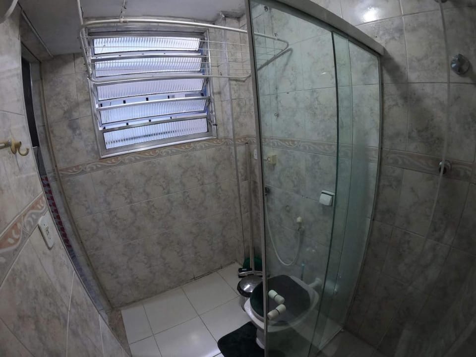 Sala living em prédio familiar na Avenida da praia Apartment in Santos